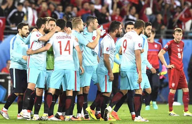 Turkish players celebrate their victory at the end of the Euro 2016 group D football match between Czech Republic and Turkey at Bollaert-Delelis stadium in Lens on June. Pic/AFP