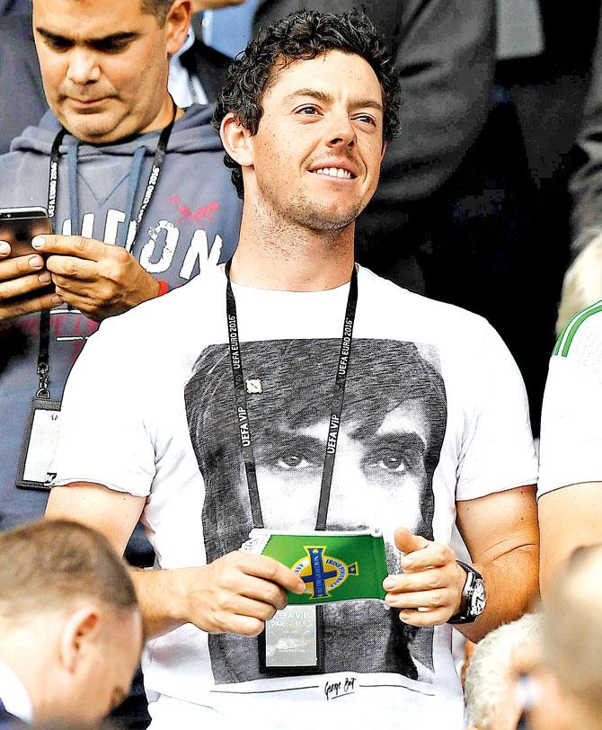Rory McIlroy watches the Euro 2016 tie between Northern Ireland and Germany in Paris on Tuesday. Pic/Getty Images