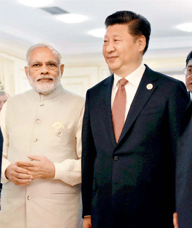 Prime Minister Narendra Modi with Chinese President Xi Jinping. Pic/PTI
