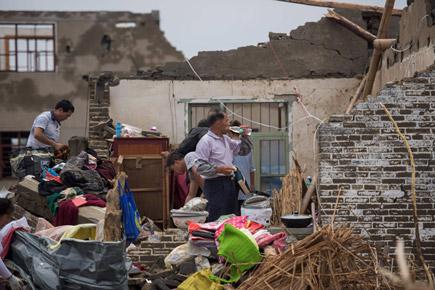 China tornado, hailstorm toll rises to 99