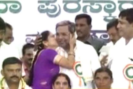 Watch video: 'Cheeky' Karnataka CM gets a kiss from a woman
