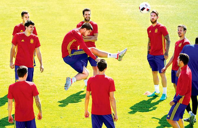 Super striker: Spanish striker Alvaro Morata tries an acrobatic kick during training at the St Martin de Re