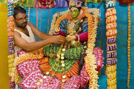 Idols of gods and goddesses with toffee and chocolates in Bengaluru