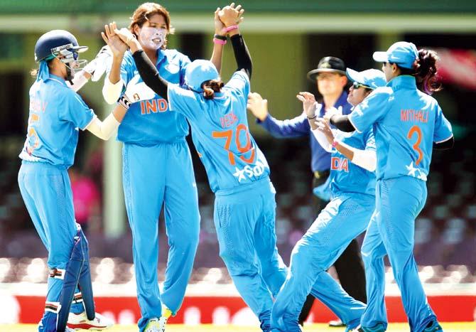 India pacer Jhulan Goswami (second from left) celebrates an Australian wicket with teammates during the first T20 match at the Sydney Cricket Ground, Australia earlier this year. Pic/Getty Images