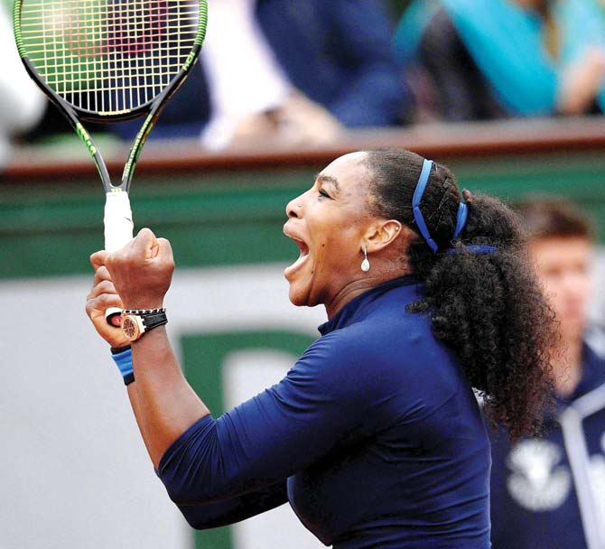 A jubilant Serena Williams celebrates after her quarter-final 5-7, 6-4, 6-1 win over Kazakhstan