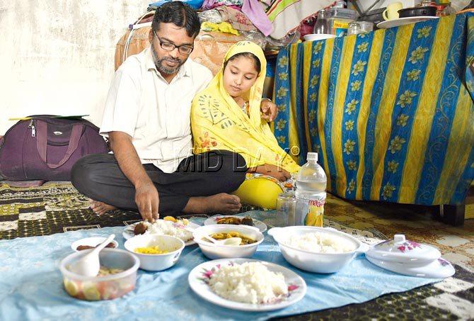 Abdul Wahid Din Mohammed Shaikh, accused of harbouring Pakistani nationals who along with 13 Indian conspirators allegedly assembled the bombs that went off in the 7/11 blasts at his Mumbra home, says the time spent in prison kept him away from his children — son Umar then 1.5 years and daughter Umrah in pic, then six months. "I missed out on taking them out on vacations, picking them up from school. I have lost the most precious days of my life," he says. Pic/Rana Chakraborty