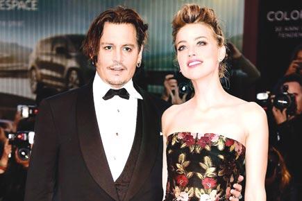 Johnny Depp and Amber Heard in a battle over their dogs?