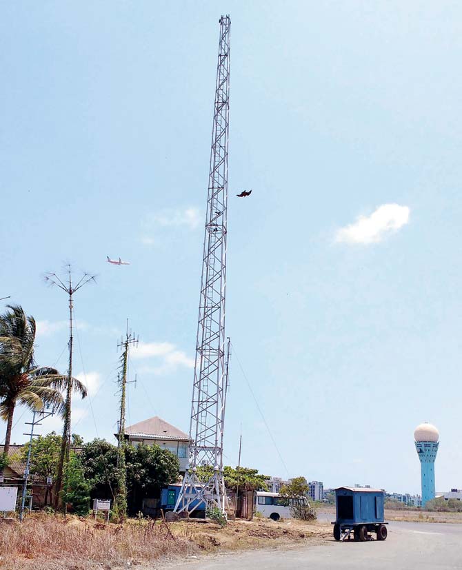 The 130-ft antenna stands close to the Juhu Air Traffic Control (ATC) and near the secondary runway 16-24, adjacent to the minaret on the other side
