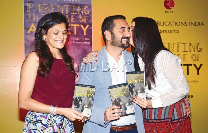 Neerja Birla (l), Dr Zirak Marker and Aishwarya Rai Bachchan at the launch of Parenting in the Age of Anxiety, by Dr Marker at a South Mumbai venue last morning. Pic/Bipin Kokate