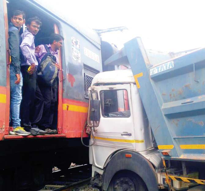 The dumper crashed into a local just ahead of Khandeshwar station yesterday