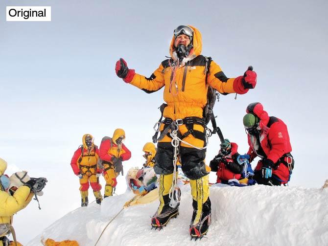 In this original photo, Satyarup Siddhanta is seen exulting on top of the Everest