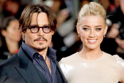 Johnny Depp's lawyer's request to depose Amber Heard denied