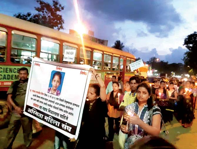 The victim’s family and neighbours started the candle-light vigil from Malwani Church but were stopped before they could reach the police station