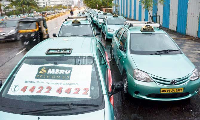 Meru Cabs parked in Malad. Pics/Satej Shinde