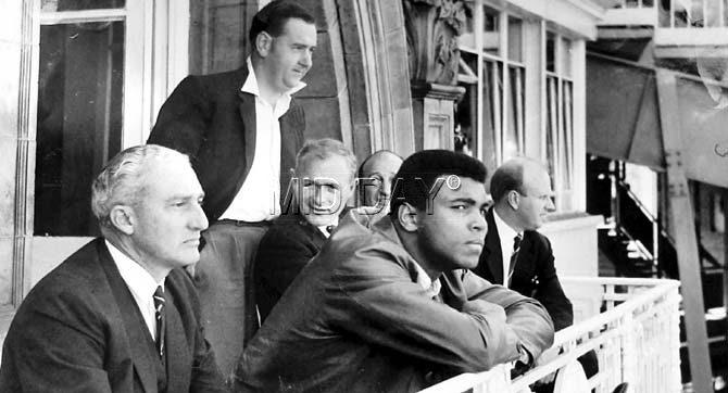 Legendary boxer Muhammad Ali watches the England vs West Indies Test from the Lord’s Cricket Ground balcony in 1966. England captain Colin Cowdrey is behind Ali while West Indies team manager Jeff Stollmeyer is to Ali’s right. Pic Courtesy: Brian Camacho’s personal collection