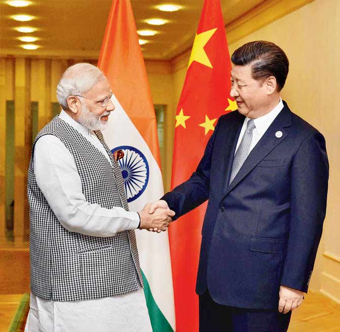 See you soon: Prime Minister Narendra Modi and Chinese President Xi Jinping at the SCO summit last week. Pic/PTI