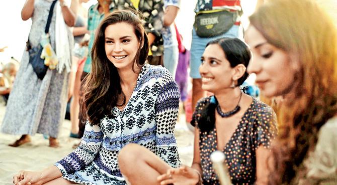 Sarah Todd (left) explores offbeat Goa in a still from Serve It Like Sarah