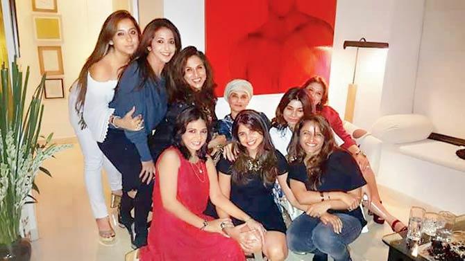Shalini Sharma (sitting, in white) with friends