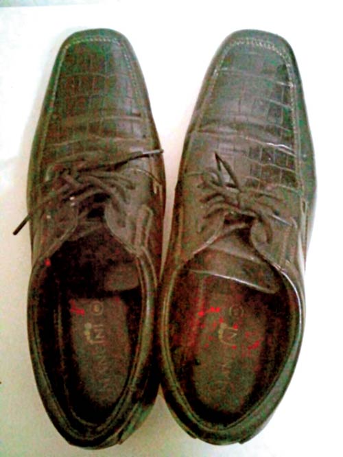 The leather shoes the conmen left behind