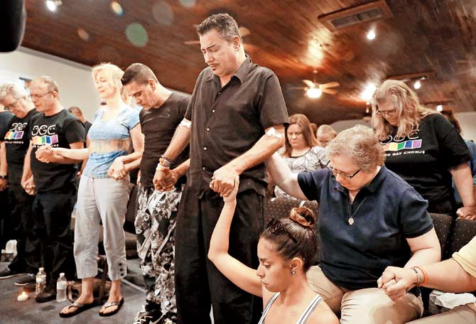 A memorial service at a church for the victims of the attack. Pic/AFP