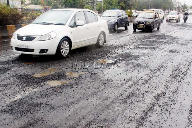 Domestic airport: Gravel on the pothole-ridden road near the airport is forcing motorists, especially those on two-wheelers, to tread cautiously to avoid mishaps