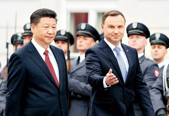China’s President Xi Jinping and his Polish counterpart Andrzej Duda after signing a cooperation treaty between China and Poland at the presidential palace in Warsaw on June 20. Pic/AFP