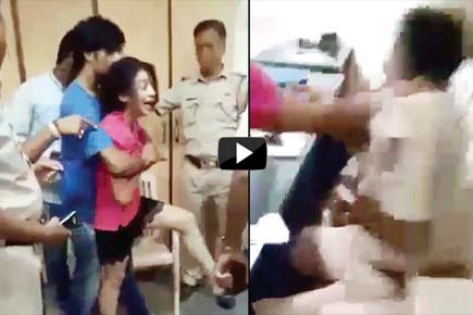 Watch Video: Drunk woman assaults cops, ransacks police station