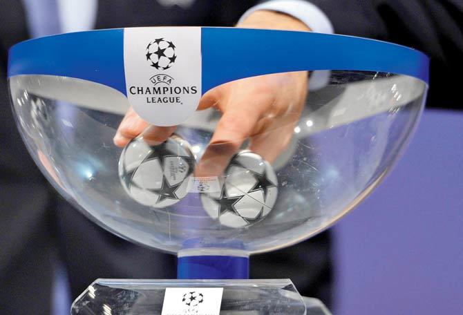 Draw balls are shuffled during the Champions League draw in Nyon last year. pic/Getty Images