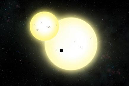 Astronomers discover largest planet orbiting two suns