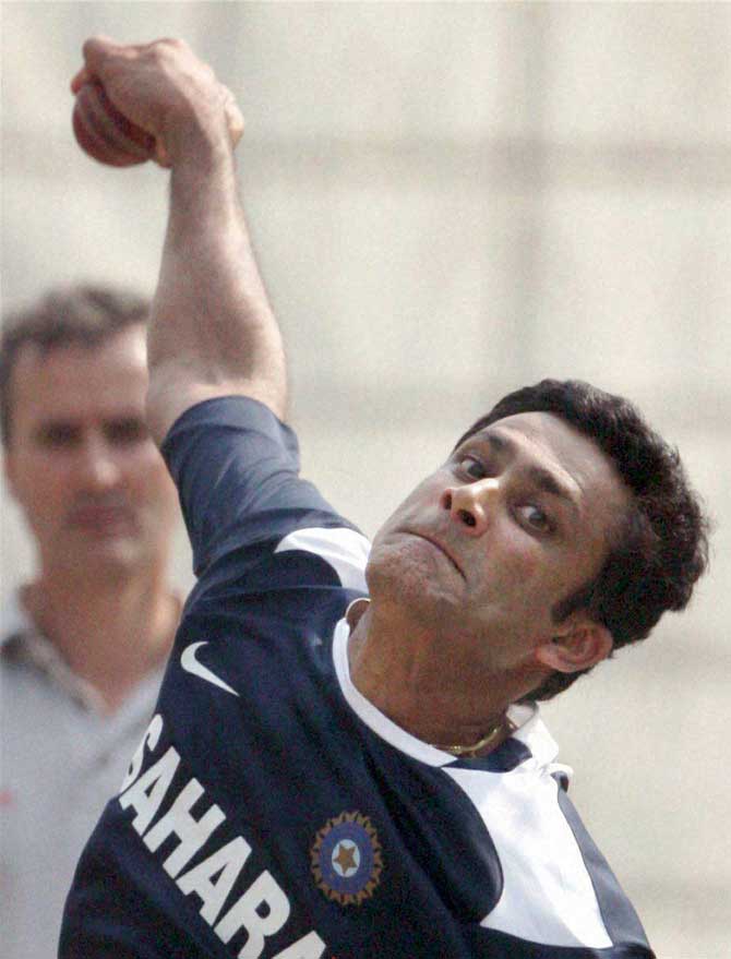 Cricket legend Anil Kumble bowling in the nets. Pic/AFP