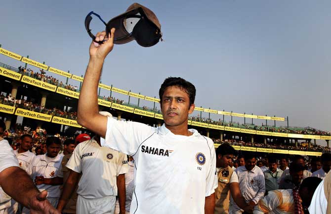 In this photograph taken on November 2, 2008, Indian cricket captain Anil Kumble salutes the crowd on last day of the third Test match between India and Australia at The Feroz Shah Kotla Stadium in New Delhi.