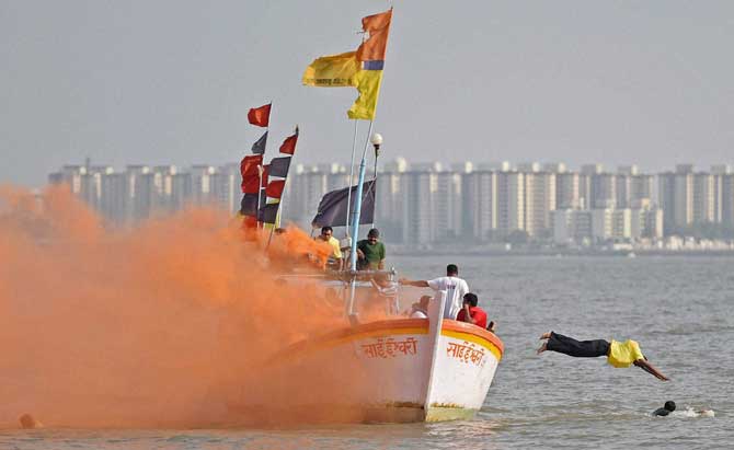 Firefighters carrying out a pre-monsoon rescue mock drill in the Arrabian sea near Marine Drive in Mumbai on Tuesday. PTI