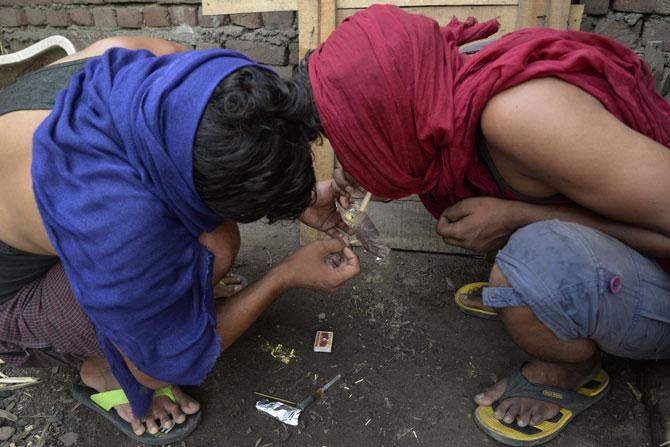 Youths taking drugs in Jalandhar in Punjab.