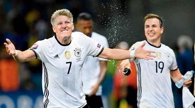 Germany’s Bastian Schweinsteiger (left) shows his delight after scoring during the Euro 2016 match against Ukraine at Stade Pierre Mauroy in Lille on Sunday. pic/AFP