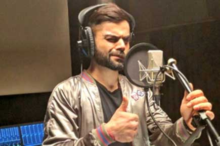 'Singer' Virat Kohli's candid shot while rapping to Rahman's tune