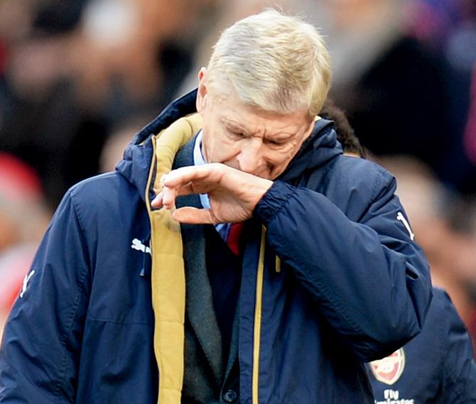 Arsenal manager Arsene Wenger reacts after his team’s defeat to Manchester United at Old Trafford on Sunday. Pic/AFP