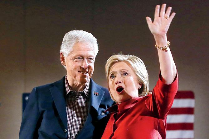 Democratic presidential candidate Hillary Clinton and her husband former US president Bill Clinton greet supporters during a caucus day event at Caesers Palace on February 20 in Las Vegas. Hillary defeated Democratic rival US Sen Bernie Sanders in the Nevada Democratic caucuses. PIC/AFP