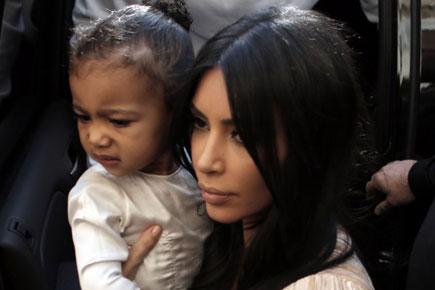 Kim Kardashian's daughter tumbles during outing