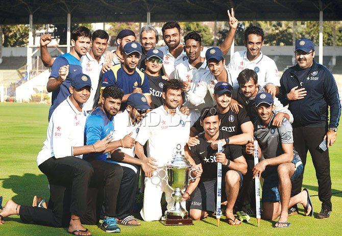 The Rest of India team with the Irani Cup at the Brabourne Stadium. Pics/Suresh Karkera