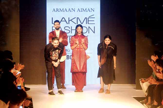 Armaan Randhawa and Aiman Agha take a bow at the end of their Lakmé Fashion Week 2014 show in Mumbai; Their March 1, 2016 Facebook post announced the label was now simply called Aiman 