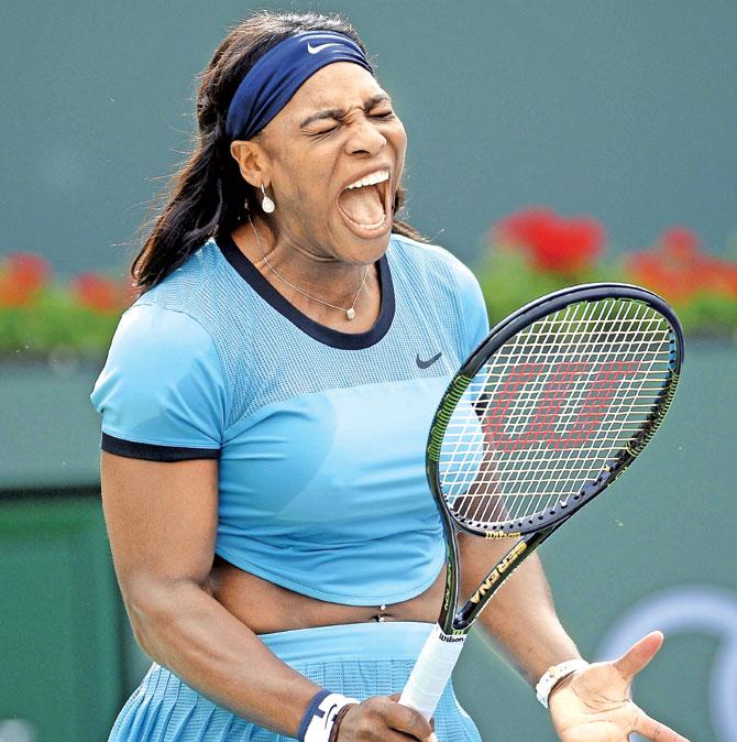 Serena Williams reacts during her third round singles match against Kazakhstan