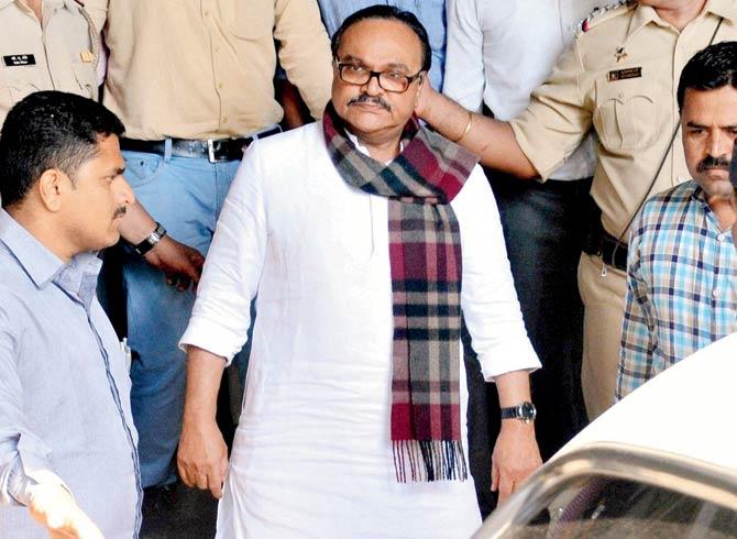 Bhujbal being taken to the special PMLA court yesterday. Pic/PTI