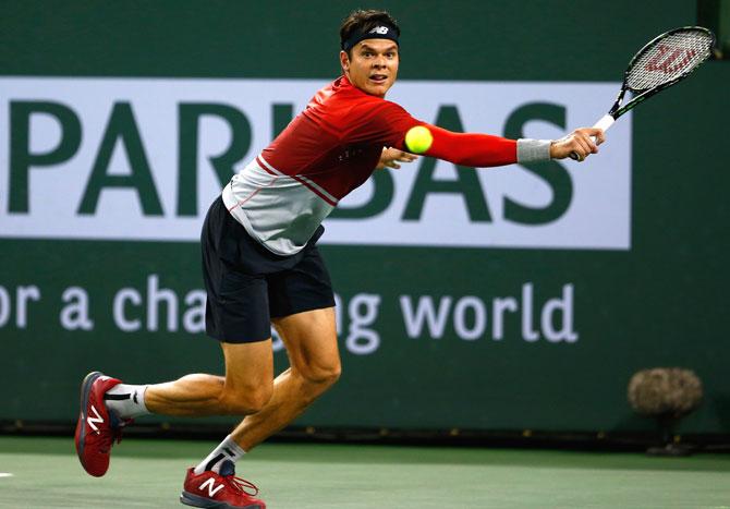 Milos Raonic of Canada in action in his match against Gael Monfils of France during day eleven of the BNP Paribas Open at Indian Wells Tennis Garden in Indian Wells. Pic/AFP