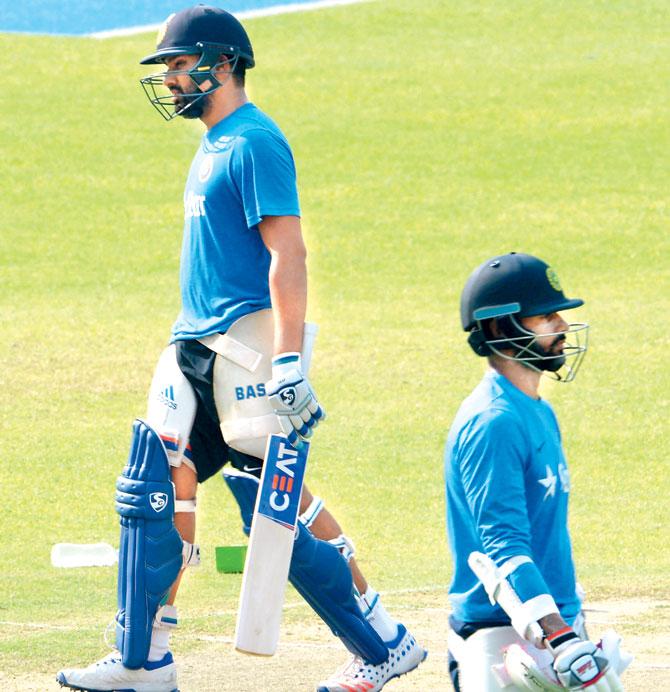 Rohit Sharma and Shikhar Dhawan (right) at the Eden Gardens nets yesterday