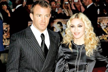 Guy Ritchie spotted visiting Madonna's house with son