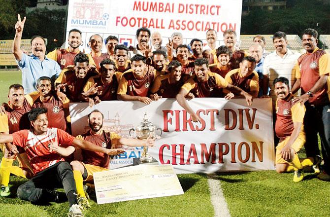 The Reserve Bank of India team which clinched the Mumbai District Football Association (MDFA) league title at the Cooperage on Saturday