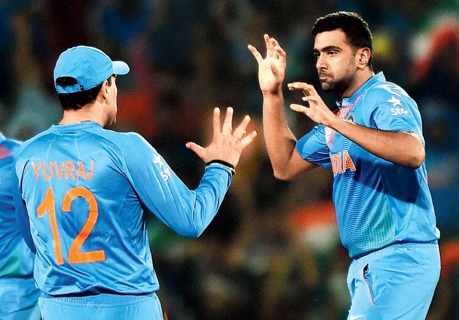 Ravichandran Ashwin celebrates the wicket of NZ