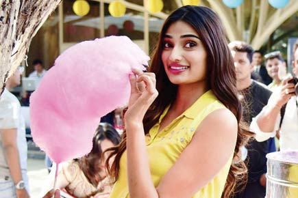Spotted: Athiya Shetty tucks into a candy floss at an event in Mumbai