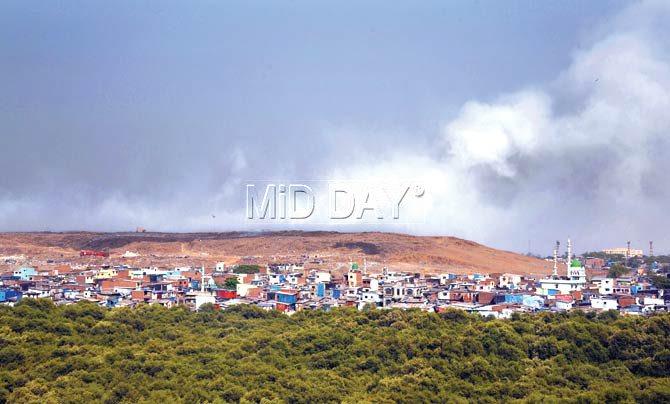 For the second time in as many months, the mountains of trash at the Deonar dumping ground are ablaze, with the authorities having failed to take any lessons from the January incident. Pic/Sameer Markande