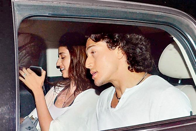 Tiger Shroff and Disha Patani left the multiplex together in the same car. pics/yogen shah